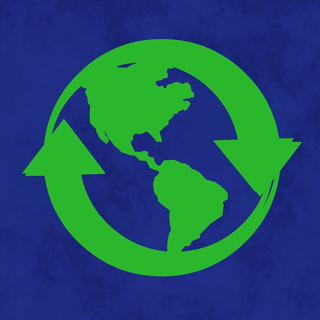 An image of a green recycling symbol and the world on a blue background